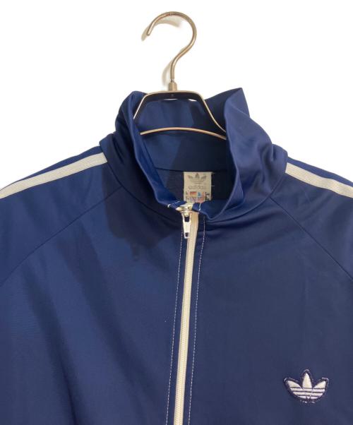 adidas（アディダス）adidas (アディダス) 曲がりポケットトラックジャケット ネイビー サイズ:Lの古着・服飾アイテム