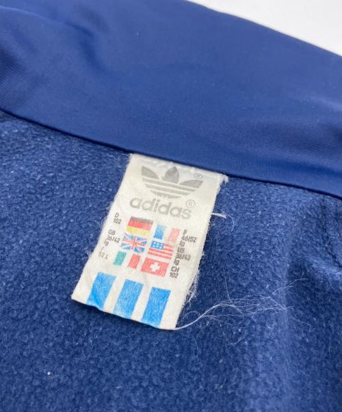 adidas（アディダス）adidas (アディダス) 曲がりポケットトラックジャケット ネイビー サイズ:Lの古着・服飾アイテム