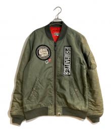 A BATHING APE×UNDEFEATED（アベイシングエイプ×アンディフィーテッド）の古着「ワッペン装飾MA-1ジャケット」｜カーキ