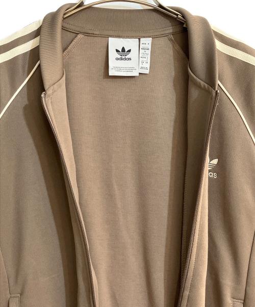adidas（アディダス）adidas (アディダス) クラシックス SSTトラックジャケット ベージュ サイズ:Ｌの古着・服飾アイテム
