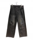 SUPPLIERサプライヤー）の古着「Tribal Leather Patch Baggy Denim Jeans」｜ブラック