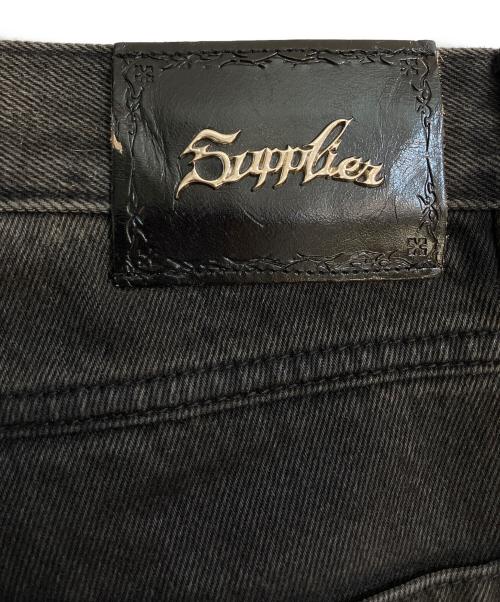 SUPPLIER（サプライヤー）SUPPLIER (サプライヤー) Tribal Leather Patch Baggy Denim Jeans ブラック サイズ:XLの古着・服飾アイテム