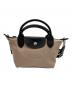 LONGCHAMP（ロンシャン）の古着「ル プリアージュ® エナジー XS トップハンドルバッグ」｜ベージュ