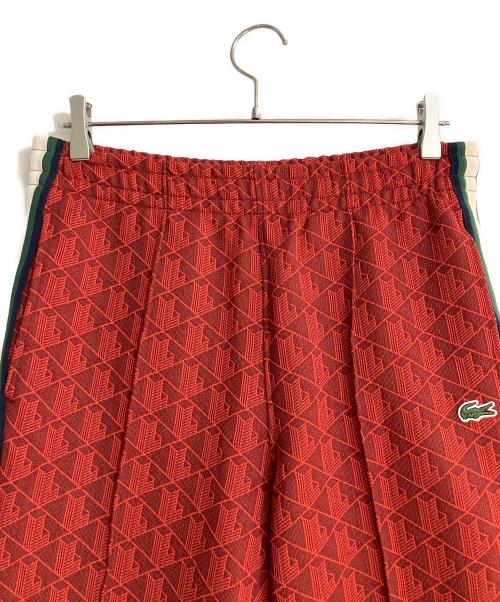 LACOSTE（ラコステ）LACOSTE (ラコステ) サイドテーピングモノグラムジャカードトラックパンツ レッド サイズ:Sの古着・服飾アイテム