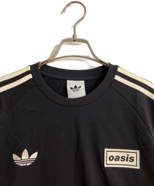 adidas（アディダス）adidas (アディダス) oasis (オアシス) ツアー スリーストライプス 長袖Tシャツ ブラック サイズ:XLの古着・服飾アイテム