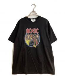 eYe COMME des GARCONS JUNYAWATANABE MAN（アイ コム デ ギャルソン ジュンヤ ワタナベ マン）の古着「綿度詰め天竺 製品プリントAC/DC Tシャツ」｜ブラック