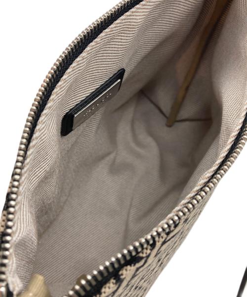 IACUCCI（イアクッチ）IACUCCI (イアクッチ) モノグランマ ポーチSD JACQUARD/RUGA ベージュの古着・服飾アイテム