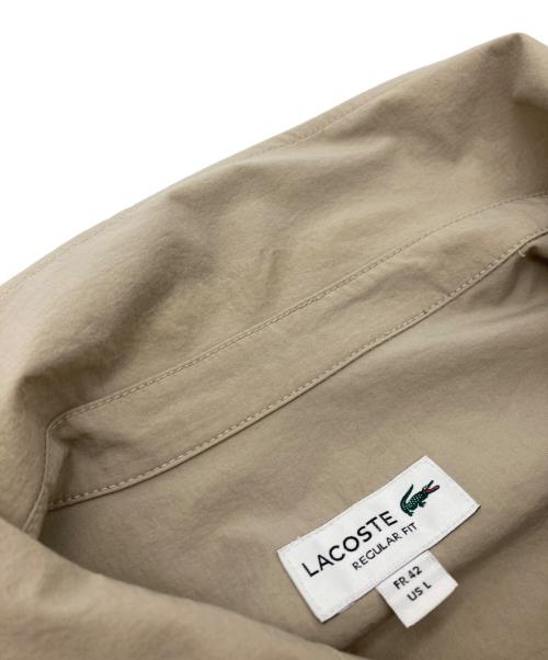 LACOSTE（ラコステ）LACOSTE (ラコステ) ワニ刺繍ナイロンシャツジャケット ベージュ サイズ:Ｌの古着・服飾アイテム
