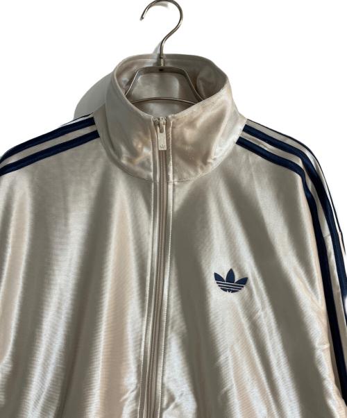 adidas（アディダス）adidas (アディダス) U FIREBIRD TT/「ユー ファイヤーバード トラックトップ ベージュ サイズ:Mの古着・服飾アイテム