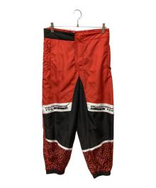 DOLCE & GABBANA×呪術廻戦（ドルチェ＆ガッバーナ×ジュジュツカイセン）の古着「コラボトラックパンツ」｜ブラック×レッド