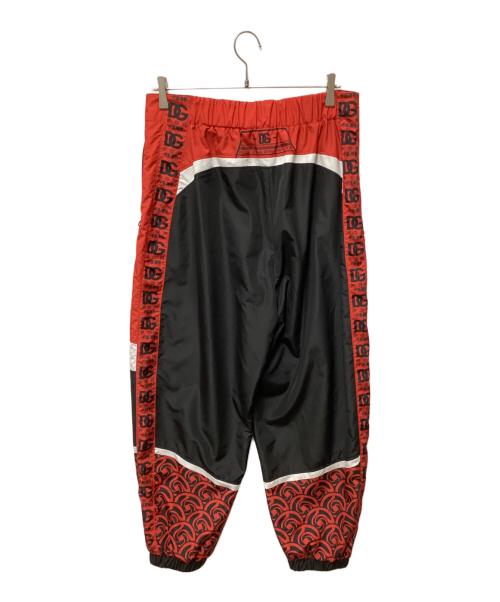 DOLCE & GABBANA（ドルチェ＆ガッバーナ）DOLCE & GABBANA (ドルチェ＆ガッバーナ) 呪術廻戦 (ジュジュツカイセン) コラボトラックパンツ ブラック×レッド サイズ:48の古着・服飾アイテム