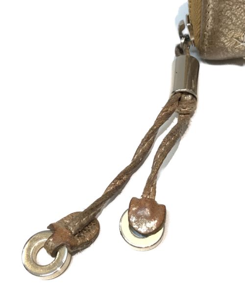 JIMMY CHOO（ジミーチュウ）JIMMY CHOO (ジミーチュウ) スタースタッズウォレット ゴールドの古着・服飾アイテム