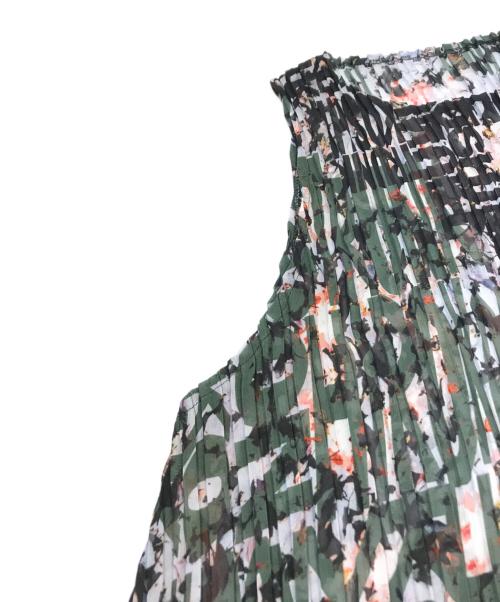TRUNK HIROKO KOSHINO（トランク ヒロコ コシノ）TRUNK HIROKO KOSHINO (トランク ヒロコ コシノ) フラワーロゴシフォンプリーツワンピース /日本製　RSEJW04490 グリーン サイズ:38 未使用品の古着・服飾アイテム
