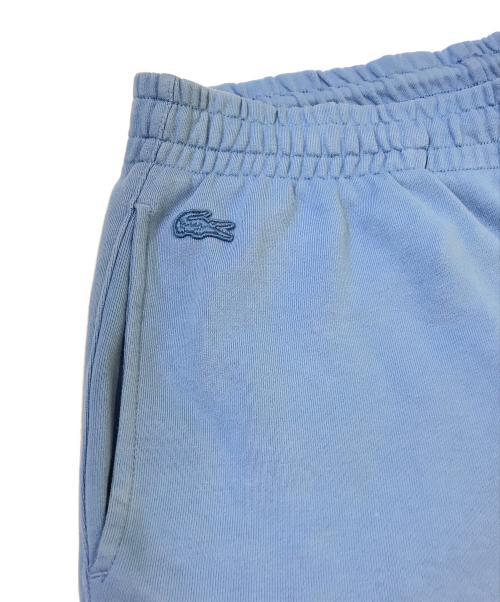 LACOSTE（ラコステ）LACOSTE (ラコステ) stranger things (ストレンジャーシングス) スウェットパンツ スカイブルー サイズ:5の古着・服飾アイテム
