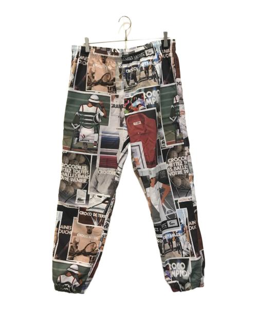 LACOSTE（ラコステ）LACOSTE (ラコステ) 総柄転写プリントトラックパンツ マルチカラー サイズ:Lの古着・服飾アイテム