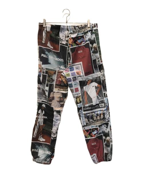 LACOSTE（ラコステ）LACOSTE (ラコステ) 総柄転写プリントトラックパンツ マルチカラー サイズ:Lの古着・服飾アイテム