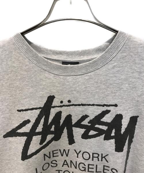 stussy（ステューシー）stussy (ステューシー) WORLD TOUR CREW SWEAT グレー サイズ:Lの古着・服飾アイテム