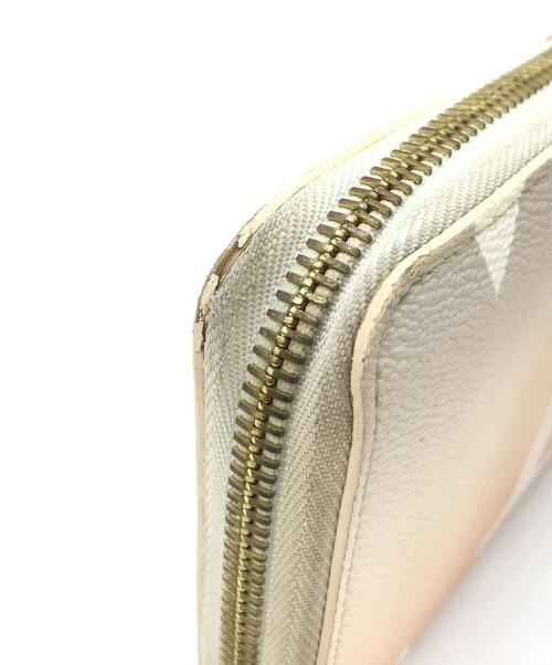 LOUIS VUITTON（ルイ ヴィトン）LOUIS VUITTON (ルイ ヴィトン) ブリューム ラウンドジップウォレット オレンジの古着・服飾アイテム