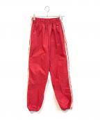 adidasアディダス）の古着「ナイロンパンツ」｜レッド