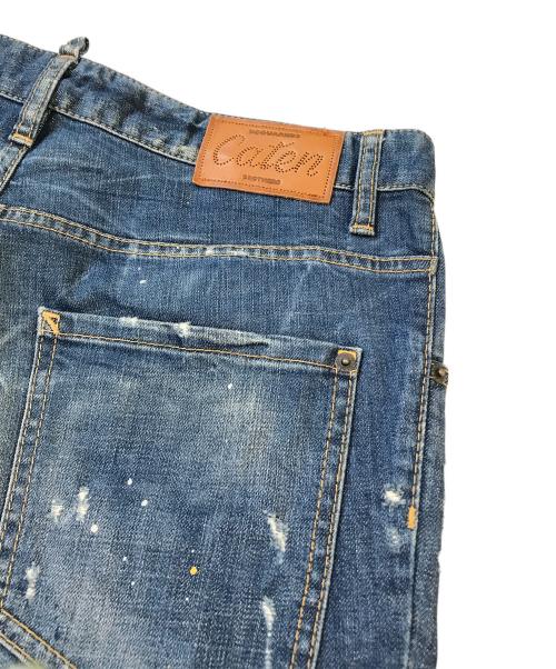 DSQUARED2（ディースクエアード）DSQUARED2 (ディースクエアード) ダメージ加工ペイントデニムパンツ S74LB0114 S30144 インディゴ サイズ:Mの古着・服飾アイテム