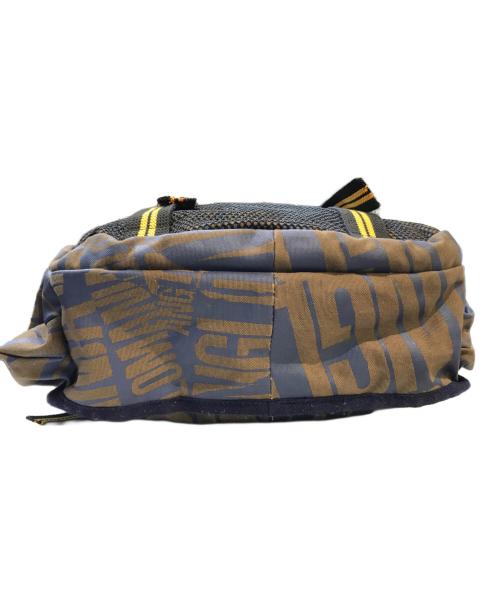 Vivienne Westwood ANGLOMANIA（ヴィヴィアンウエストウッドアングロマニア）VIVIENNE WESTWOOD ANGLOMANIA (ヴィヴィアンウエストウッドアングロマニア) 総柄バックパック カーキ×ネイビーの古着・服飾アイテム