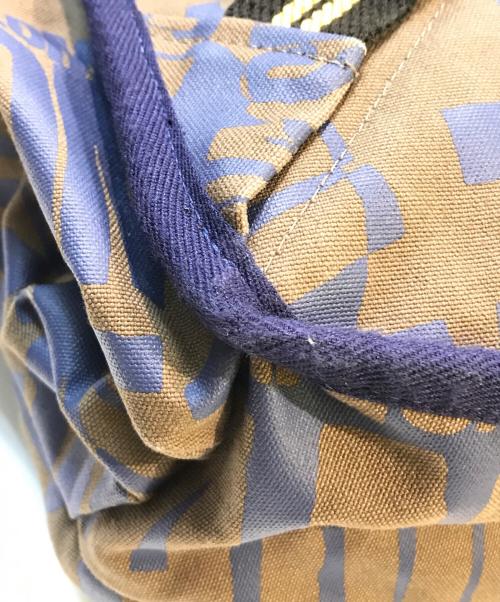 Vivienne Westwood ANGLOMANIA（ヴィヴィアンウエストウッドアングロマニア）VIVIENNE WESTWOOD ANGLOMANIA (ヴィヴィアンウエストウッドアングロマニア) 総柄バックパック カーキ×ネイビーの古着・服飾アイテム