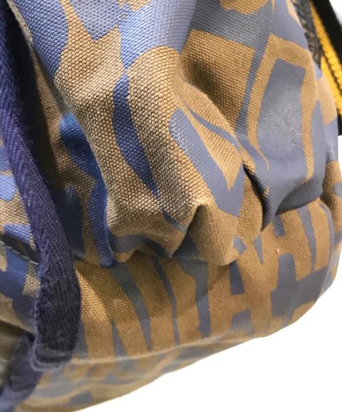 Vivienne Westwood ANGLOMANIA（ヴィヴィアンウエストウッドアングロマニア）VIVIENNE WESTWOOD ANGLOMANIA (ヴィヴィアンウエストウッドアングロマニア) 総柄バックパック カーキ×ネイビーの古着・服飾アイテム