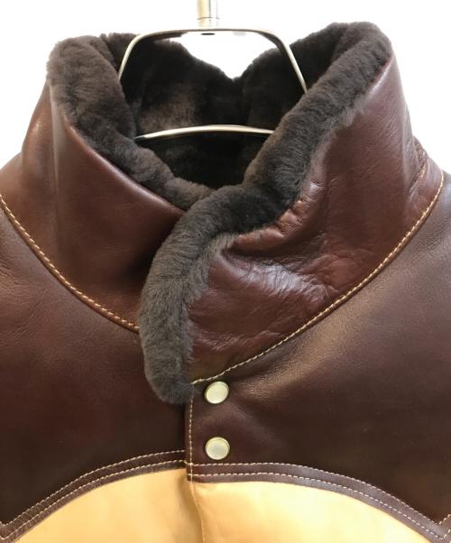 RockyMountainFeatherBed（ロッキーマウンテンフェザーベッド）RockyMountainFeatherBed (ロッキーマウンテンフェザーベッド) オールレザーダウンベスト ベージュ サイズ:Mの古着・服飾アイテム