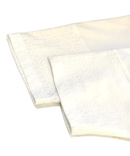 TRUNK HIROKO KOSHINO（トランク ヒロコ コシノ）TRUNK HIROKO KOSHINO (トランク ヒロコ コシノ) オパールロゴプリントチュニック　RSKHB-14360 ホワイト サイズ:Ｍ 未使用品の古着・服飾アイテム