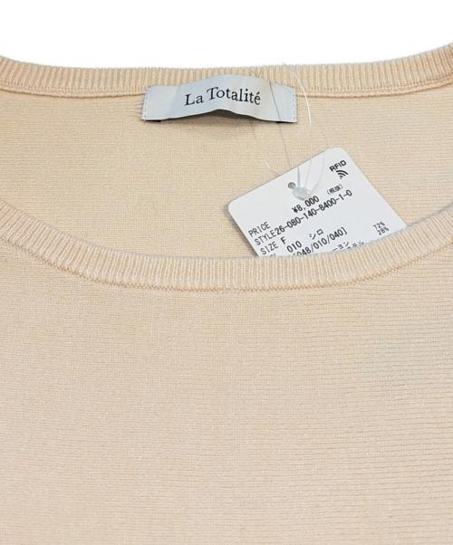 La TOTALITE（ラ ト―タリテ）La TOTALITE (ラ ト―タリテ) ウォッシャブルペプラムニットプルオーバー アイボリー サイズ:FREE 未使用品の古着・服飾アイテム
