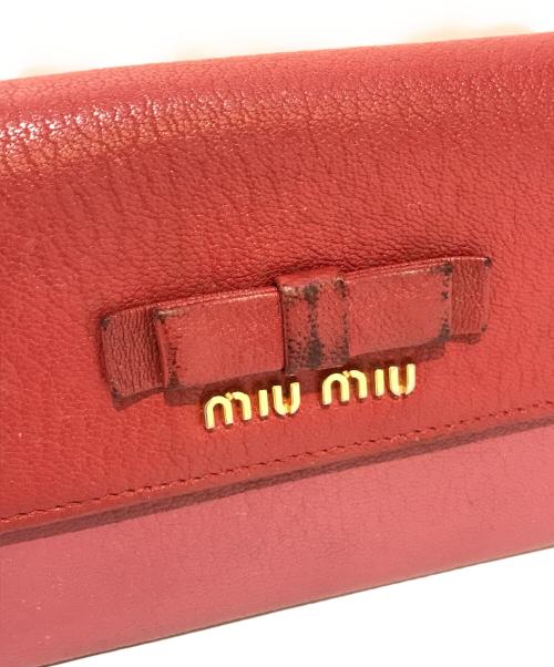MIU MIU（ミュウミュウ）MIU MIU (ミュウミュウ) リボン長財布 レッドの古着・服飾アイテム