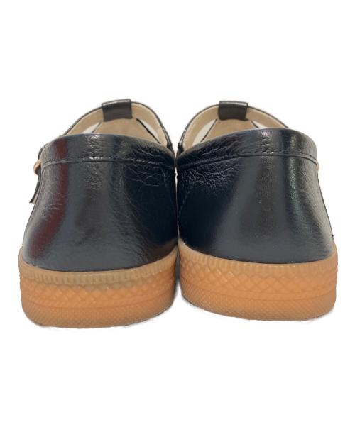 MINNETONKA（ミネトンカ）MINNETONKA (ミネトンカ) RED WOOD RIVER (レッドウッドリバー) Tストラップ フラットシューズ ブラック サイズ:24.5の古着・服飾アイテム