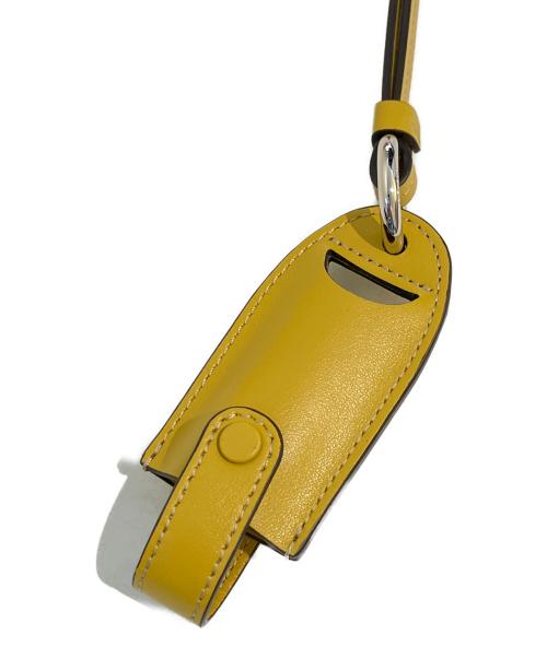 TOD'S（トッズ）TOD'S (トッズ) レザーリップスティックケース イエローの古着・服飾アイテム