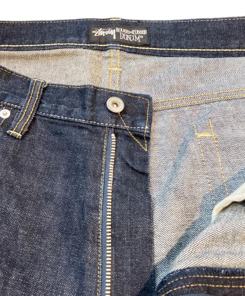 stussy（ステューシー）stussy (ステューシー) バックプリントデニムパンツ インディゴ サイズ:38の古着・服飾アイテム