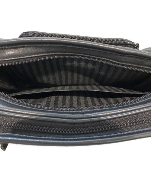 TUMI（トゥミ）TUMI (トゥミ) クラッチバッグ ブラックの古着・服飾アイテム