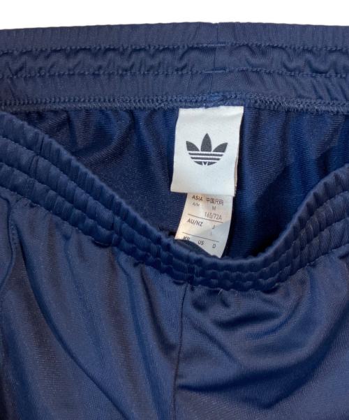 adidas（アディダス）adidas (アディダス) FIREBIRD LOOSE TRACK PANTS KC9018 ネイビー サイズ:Lの古着・服飾アイテム