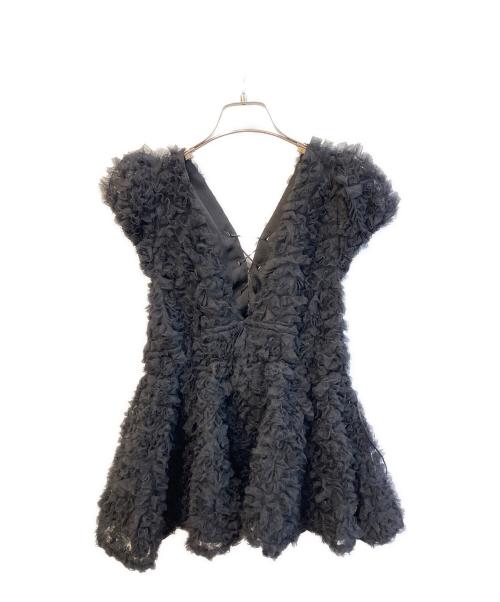 polaura（ポロ―ラ）polaura (ポロ―ラ) フラワーぺプラムバックリボンチュニック 2504-1-101 ブラック サイズ:freeの古着・服飾アイテム
