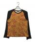 COMME des GARCONS HOMME PLUS（コムデギャルソンオムプリュス）の古着「アーカイブ総柄長袖カットソー」｜オレンジ×ブラック