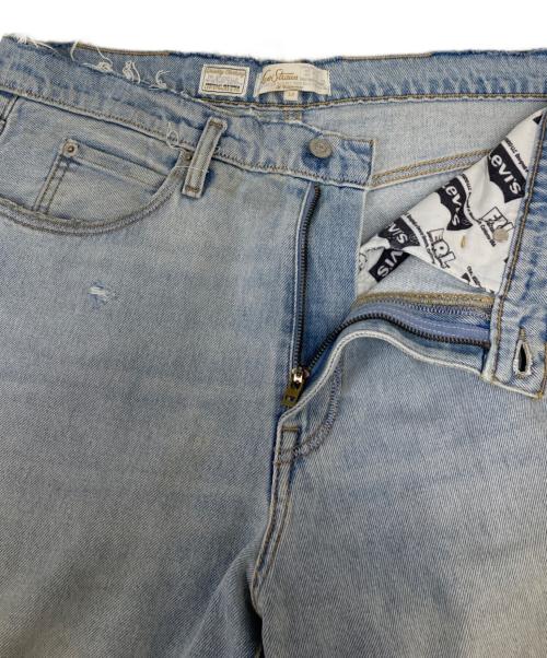 ERL（イーアールエル）ERL (イーアールエル) LEVI'S (リーバイス) コラボダメージ加工デニムパンツ スカイブルー サイズ:SIZE W32の古着・服飾アイテム