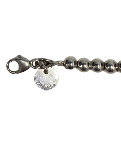 TIFFANY & Co.（ティファニー）TIFFANY & Co. (ティファニー) リターントゥブルー ハート タグ ビーズ ブレスレット シルバー×ブルーの古着・服飾アイテム