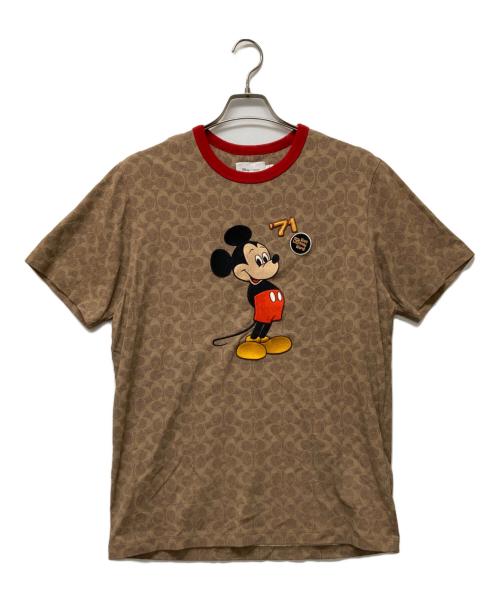 COACH（コーチ）COACH (コーチ) DISNEY (ディズニー) ミッキーマウス シグネチャー Tシャツ ベージュ サイズ:Mの古着・服飾アイテム