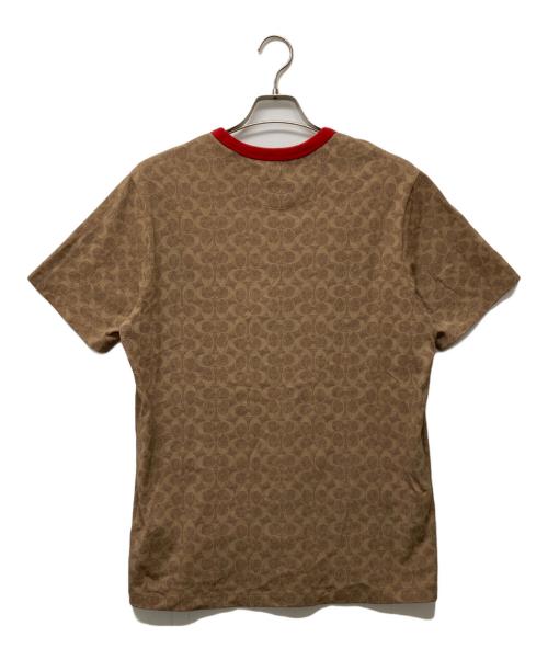 COACH（コーチ）COACH (コーチ) DISNEY (ディズニー) ミッキーマウス シグネチャー Tシャツ ベージュ サイズ:Mの古着・服飾アイテム