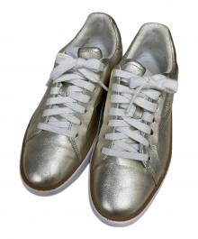 COLE HAAN（コールハーン）の古着「グランドプロ トップスピン スニーカー」｜ゴールド