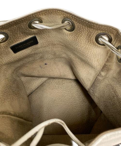 J&M DAVIDSON（ジェイ＆エム デヴィッドソン）J&M DAVIDSON (ジェイ＆エム デヴィッドソン) バイカラーフリンジ巾着ワンショルダーバッグ ホワイト×ブラックの古着・服飾アイテム