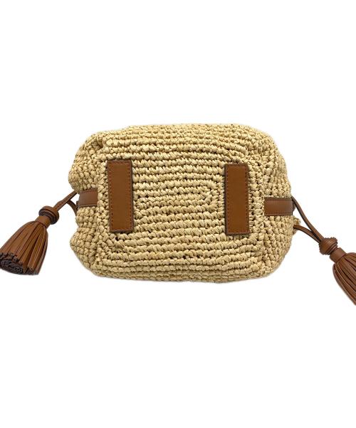 ANYA HINDMARCH（アニヤ・ハインドマーチ）ANYA HINDMARCH (アニヤ・ハインドマーチ) Small drawstring tote ベージュの古着・服飾アイテム