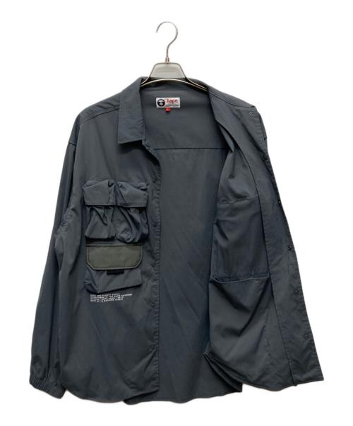 Aape BY A BATHING APE（エーエイプ バイ アベイシングエイプ）Aape BY A BATHING APE (エーエイプ バイ アベイシングエイプ) ポケットコーチジャケット/AAPSTM8372XXG グレー サイズ:Ｌの古着・服飾アイテム