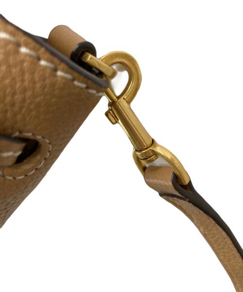 TORY BURCH（トリーバーチ）TORY BURCH (トリーバーチ) MCGRAW SMALL DRAWSTRING SATCHEL/85119 ベージュの古着・服飾アイテム