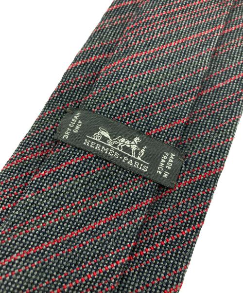 HERMES（エルメス）HERMES (エルメス) ストライプ柄シルクウールブレンドネクタイ ブラック×レッド サイズ:-の古着・服飾アイテム