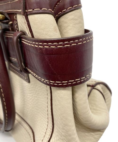 COACH（コーチ）COACH (コーチ) ハンプトンズハンドバッグ/10212 ボルドーアイボリーの古着・服飾アイテム