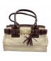 COACH（コーチ）の古着「ハンプトンズハンドバッグ/10212」｜ボルドーアイボリー